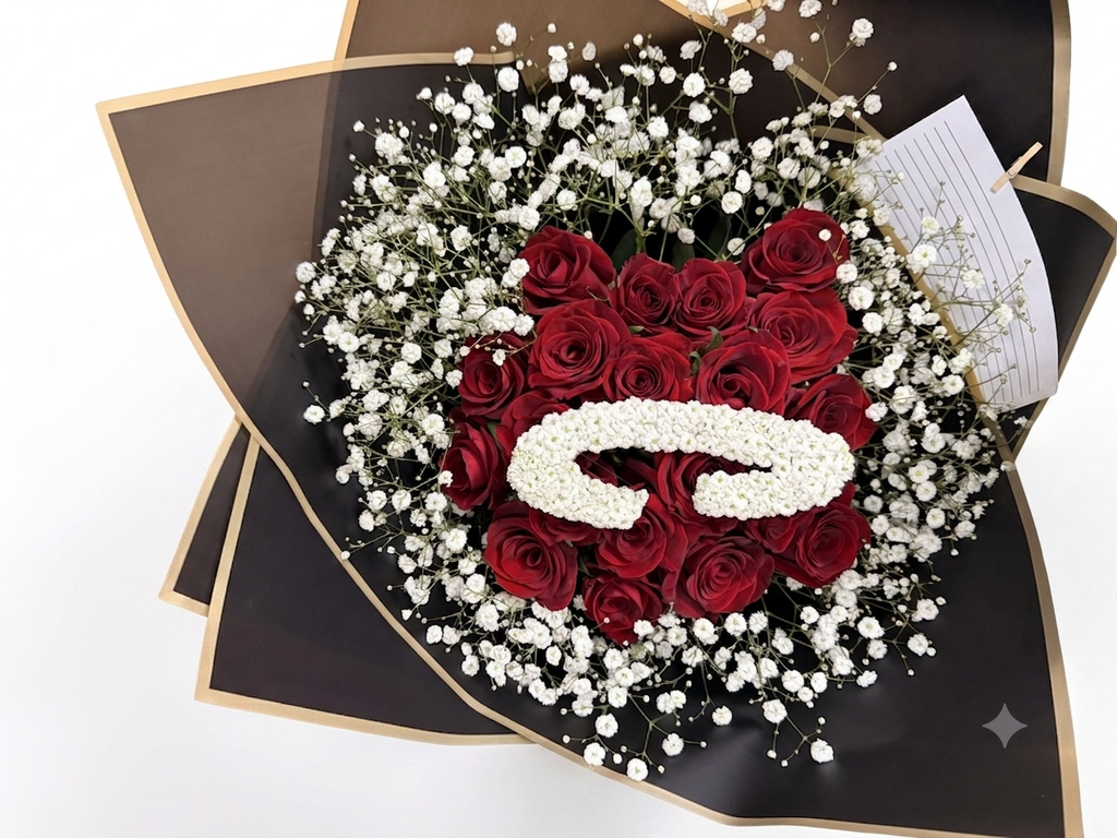 Yours, Always personalised bouquet featuring 20 premium red roses, baby’s breath and a custom floral initial, handcrafted by Die Blommemandjie Florist.
